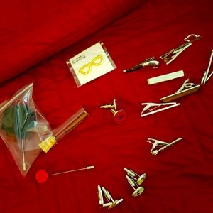 Assortment of tie clips, cuff links, lapel pins